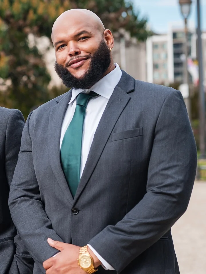 15 Plus Size Groom Outfit Ideas Trending in 2026 15 Charcoal Suit With an Emerald Tie for a Single Shot of Color